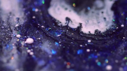 Swirling Glitter in Abstract Liquid Motion