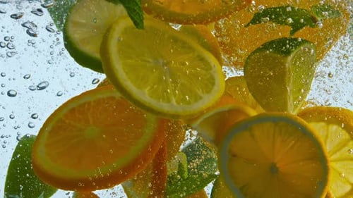 Citrus Slices Swirling in Refreshing Water