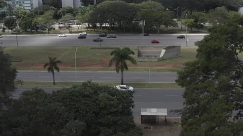 Brasilia Capital city road network, automobiles moving downtown, aerial