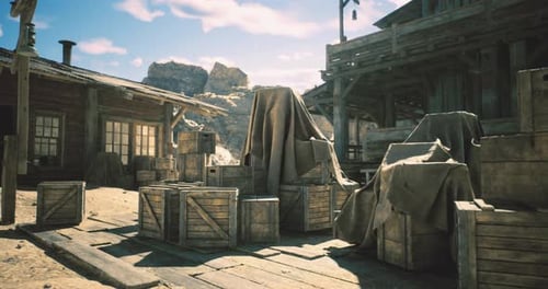 Wooden Crates and Covered Items in an Old Western Town During Daylight