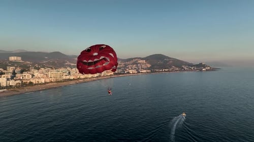 Parasailing Over the Mediterranean Sea at the Most Beautiful Sunset