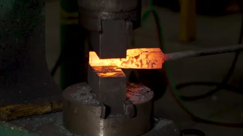Forging Red-Hot Metal with Industrial Hammer Machine