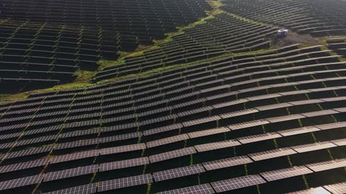 Solar panel array covers large area of land during daytime