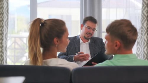 Therapist Talking with Couple About Relationship Problems