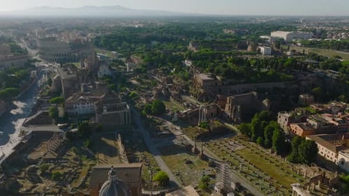 Forwards Fly Above Street Surrounded By Residential Buildings in City Centre