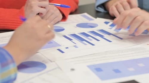 Mixed Race People Working on Documents, Close up