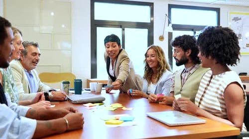 Diverse Creative Team Brainstorming Ideas with Sticky Notes