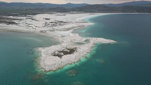 Lake Salda Cape and Turquoise Waters From Aerial Ascent
