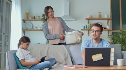 Family Relaxing at Home with Technology