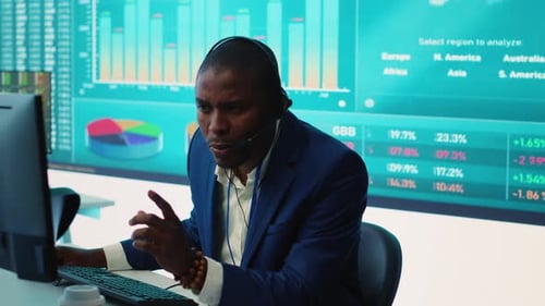 General Director Examining Statistics Big Data on Computer in a Control Room