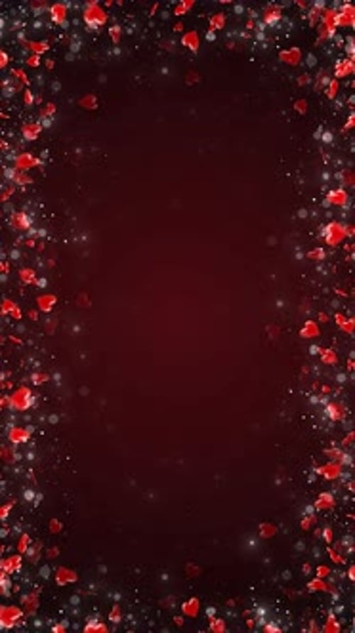 Red and pink hearts creating border frame for Valentine's day. Heart particles floating to center fr