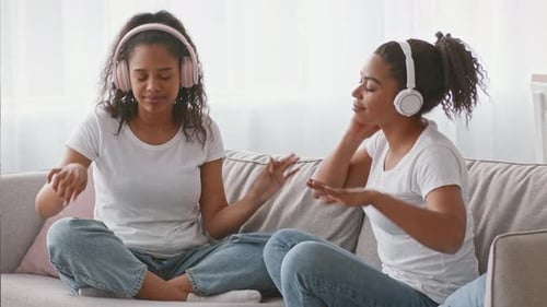 Young Adults Enjoying Music Together at Home