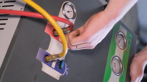 Attaching Hoses to Machine for Repair