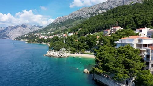 Beautiful Brela on Makarska riviera, Croatia. Adriatic Sea with amazing turquoise clean water and wh