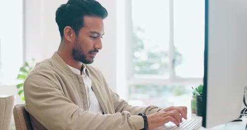 Internet, search and businessman on a computer for planning, creative and happy in office