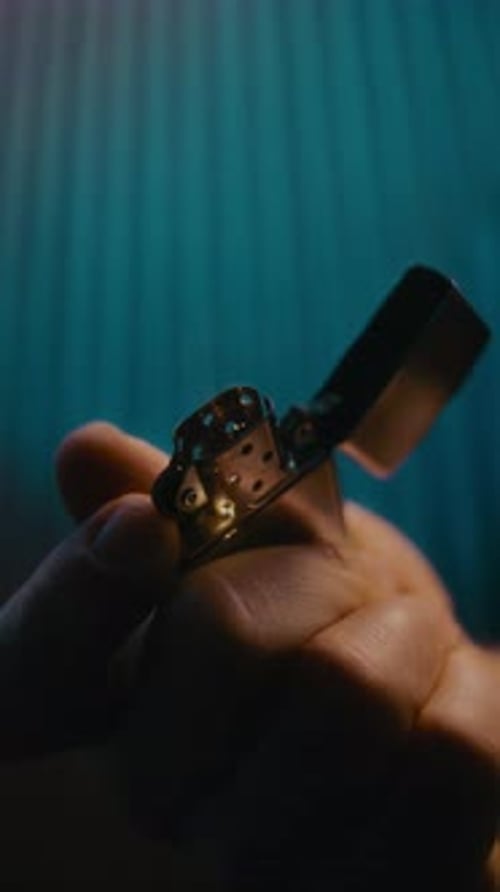Slow Motion Metal Lighter Ignition With Sparks And Flickering Flame