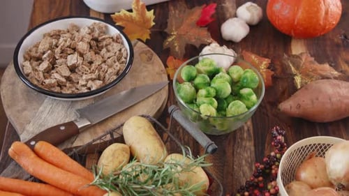 Thanksgiving Feast Ingredients on Wooden Table