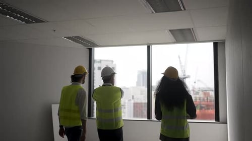 Engineers work in high rise building.