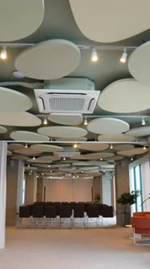 Empty Modern Conference Hall with Unique Ceiling Design