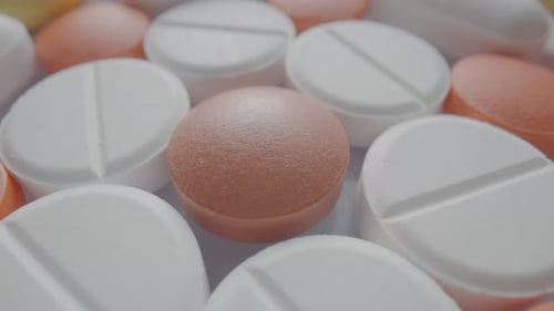 Pattern From Medical Tablets and Pills Rotating Close Up