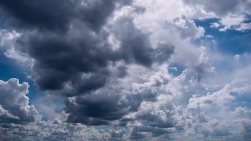 Timelapse of Dark Storm Clouds Moving Across Blue Sky