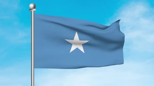 Somalia National Flag Waving on Flagpole Against Blue Sky