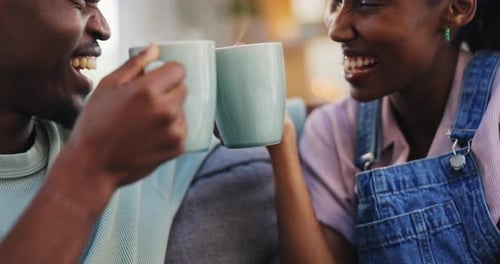 Smiling Couple Drinking Coffee Together Indoors