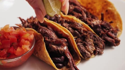 Close Up of Mouthwatering Beef Tacos with Lime