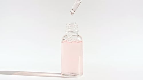 Cosmetic Bottle with Pipette on White Background Cosmetic Spa Medical Skin Care Advertising of a