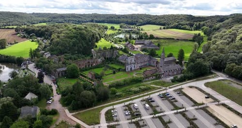 The ruins of the former Abbey of Aulne. Aerial drone video