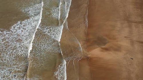 Drone aerial topdown shot of the beach