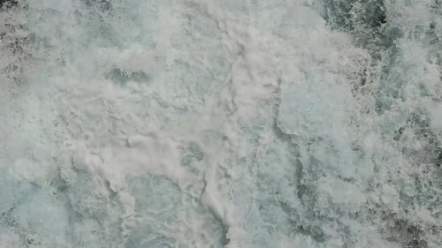 CloseUp of Foaming Water in Motion Detailed Texture of White Foaming Water in Motion Capturing the