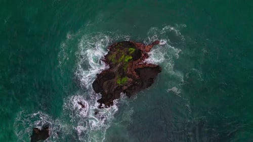Aerial Top View Beautiful Ocean with Large Sea Wave Crashing on Rocks