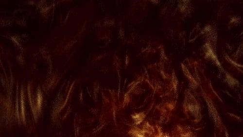 Glittering Paint Flow and Defocused YellowOrange Sparkling Fluid Create an Abstract Artistic Shot