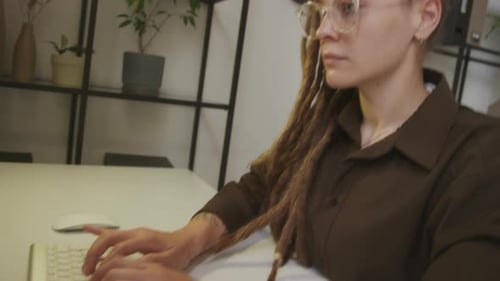 Female Programmer Program Coding on Computer in Office