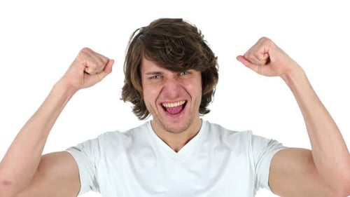Man Celebrates with Fists Pumped in the Air