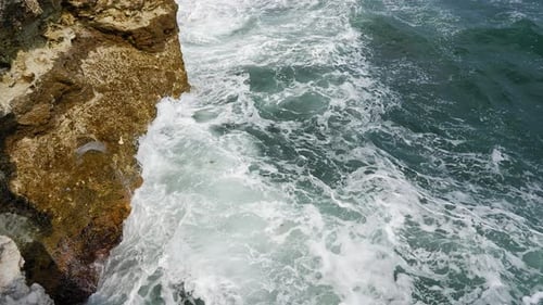 Sea Waves Wash Over the Rocks Storm and Bad Weather at Sea in Super Slow Motion