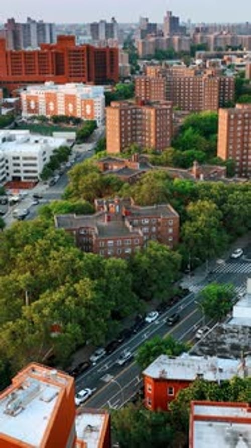 Footage above the residential area with green neighborhoods. Top view on the cityscape of New York