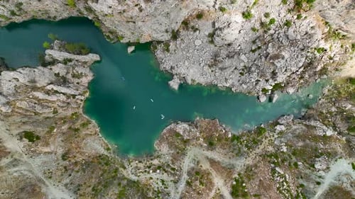 Aerial View Scenic Paddleboarding Exploration in Turkey s Canyon Adventure in Nature