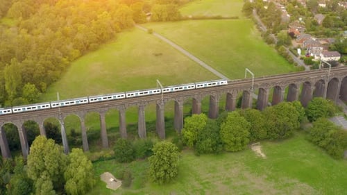 Aerial view of a moving train along the Viaduct.