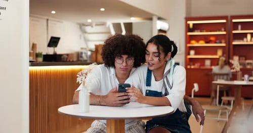 Date, couple and talking with phone in cafe for online post, social media scroll or web research