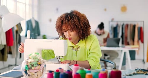 Designer, fashion and black woman with sewing machine for creative, fabric and creation production