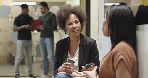 Black Women Talking During Coffee Break