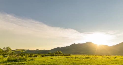Mountain Meadow Timelapse at the Summer or Autumn Sunset Time Wild Nature and Rural Field Clouds