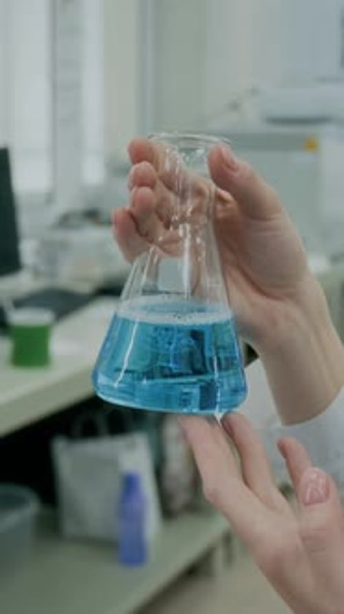 Blue Liquid in Laboratory Erlenmeyer Flask