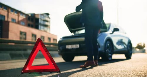 Road sign, car breakdown and man with phone call in street for battery fail