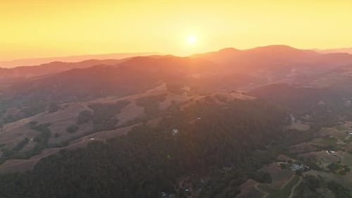 Golden Sunrise Over the Mountainous Landscape