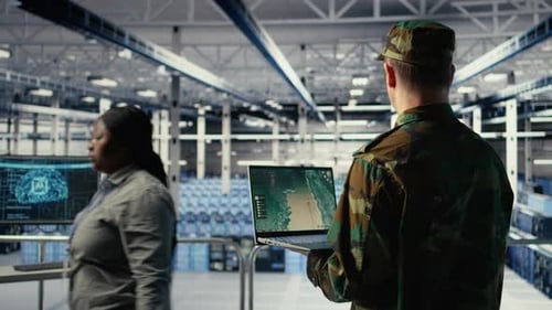 Military Data Center Expert Using Ballistic Missiles Radar on Laptop