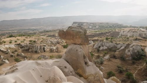 Ancient site in Cappadocia, Turkey, with tall rock formations known as the Three Beauties.