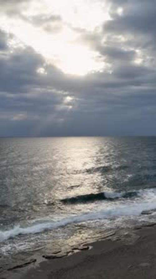 Vertical Video Above the Coastal Mystique Aerial View of Cloudy Mediterranean Coastline with